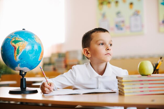 Dreamy pupil on lesson