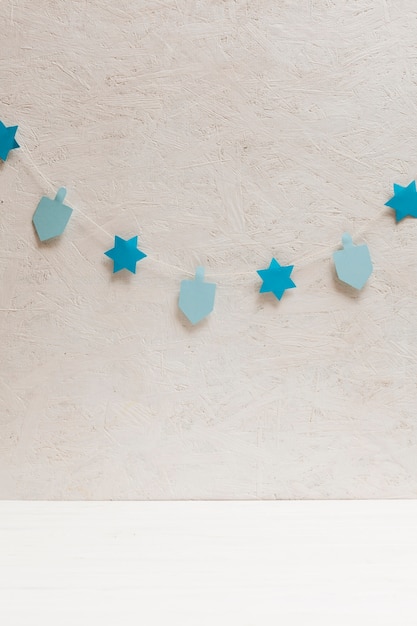 Dreidel and stars collection on the wall