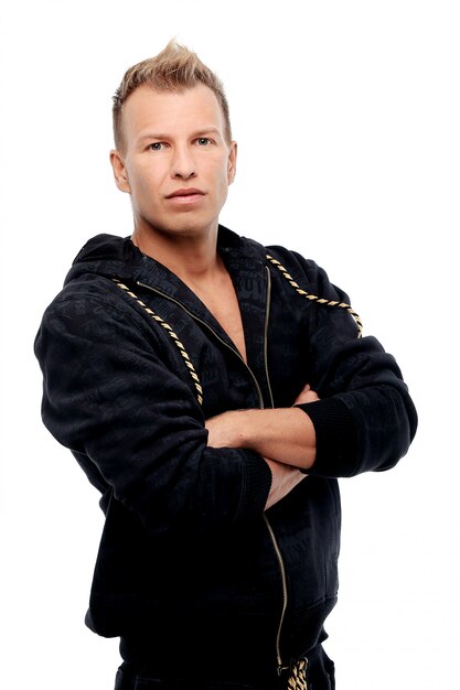 Dressed man in a suit posing in studio