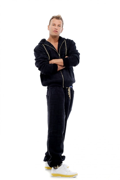 Dressed man in a suit posing in studio