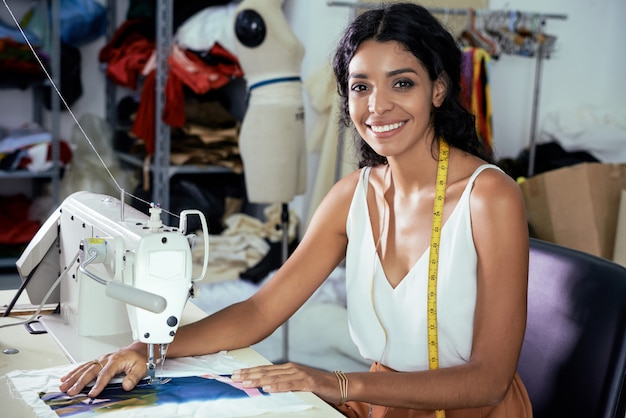 Dressmaker using sewing machine