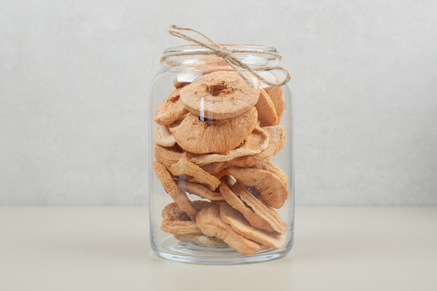 Dried apple rings in glass jar