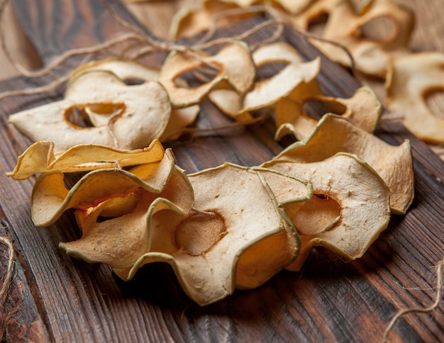 Dried apples on wooden table horizontal