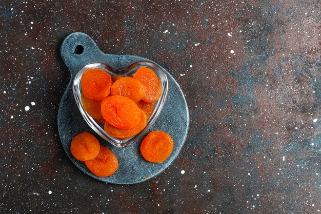 Dried apricots with fresh juicy apricot fruits,top view