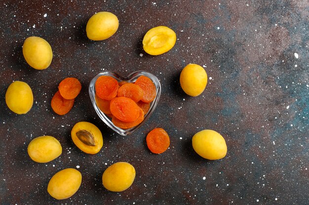 Dried apricots with fresh juicy apricot fruits