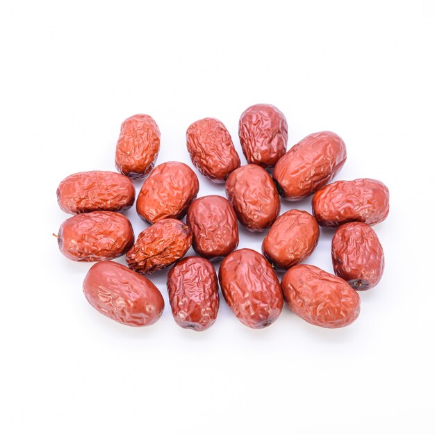 Dried Chinese dates jujube on white background closeup