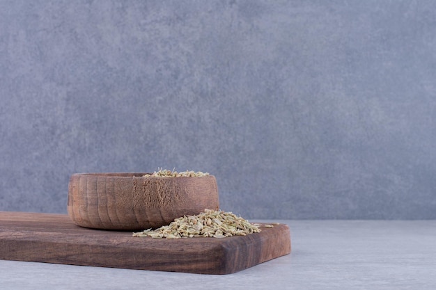 Dried green anise seeds on a platter. High quality photo