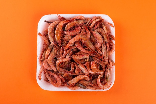 Dried shrimp with orange background Premium Photo