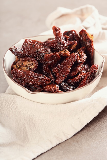 dried tomatoes on bowl