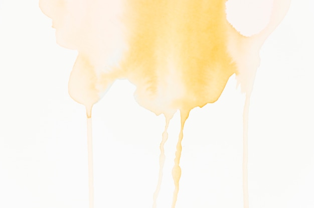 Free photo dripping watercolor splash on white background
