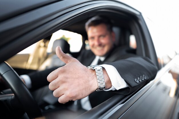 Driver dressed in elegant costume