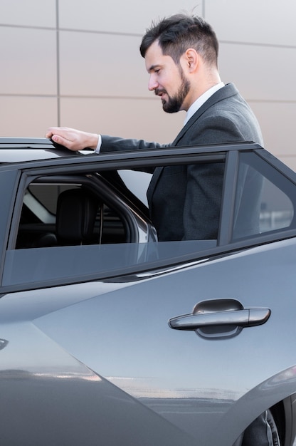 Driver with opened car door