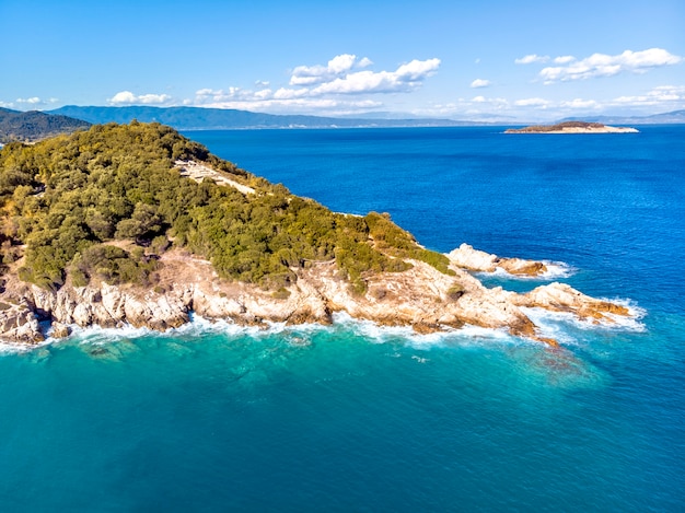 Drone aerial view of sea and rocks in Olympiada Halkidiki Greece