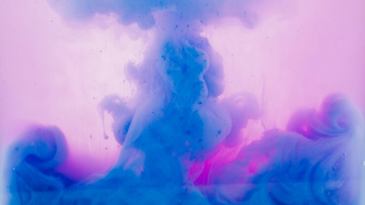 Free Photo drops of blue and magenta dye