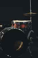 Free photo drums on a dark background part of a drum kit