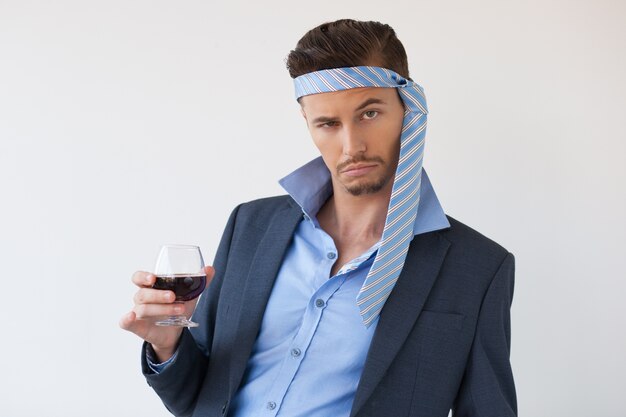 Drunk Business Man with Tie on Head and Glass