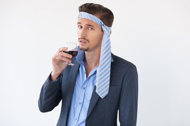 Drunk Man with Glass of Wine and Tie on Head