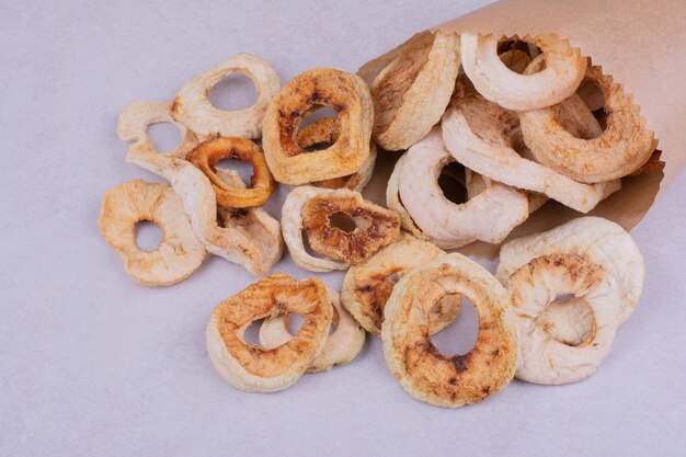 Dry apple slices inside the paper wrap