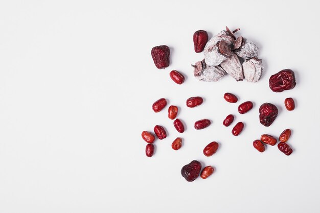 Dry fruits on white.