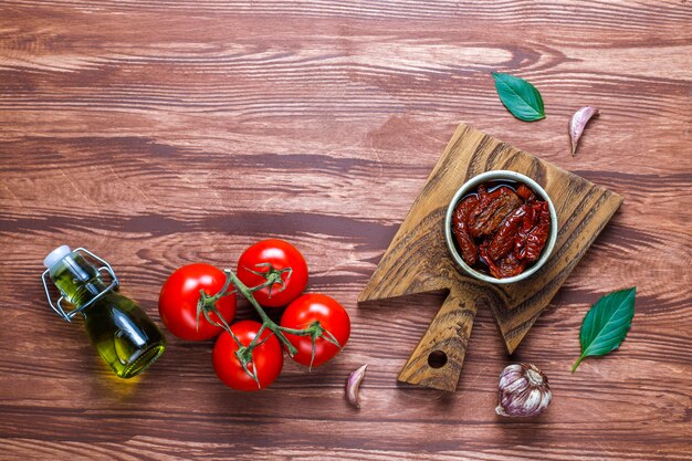 Dry tomatoes with olive oil.