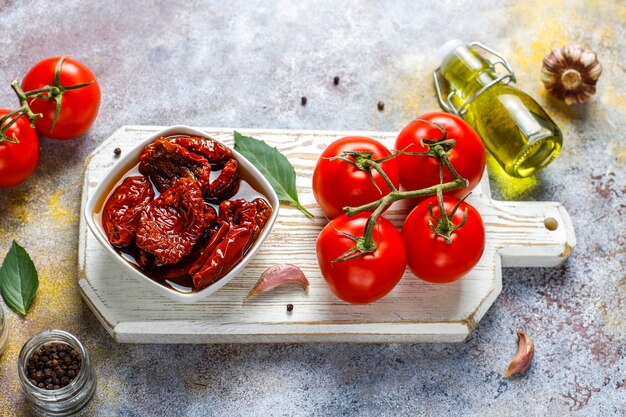 Dry tomatoes with olive oil.