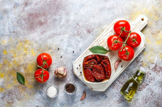 Dry tomatoes with olive oil.