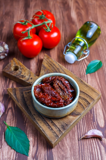 Dry tomatoes with olive oil.