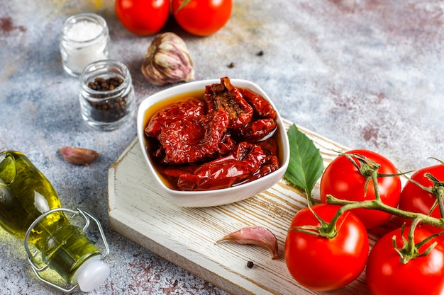 Dry tomatoes with olive oil.