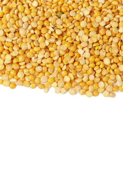 Free photo dry yellow split peas isolated on white.