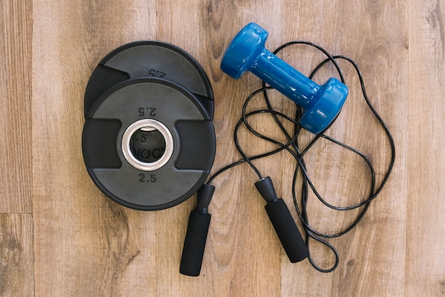 Dumbbell, jump rope and weights for barbell