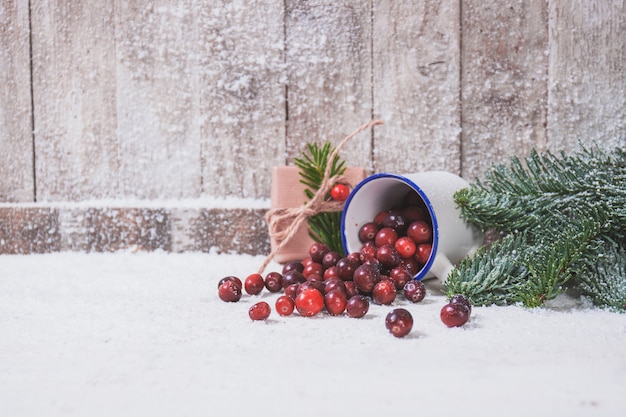 Dump cup with cherries inside and ornaments