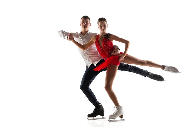 Duo figure skating isolated on white studio backgound with copyspace