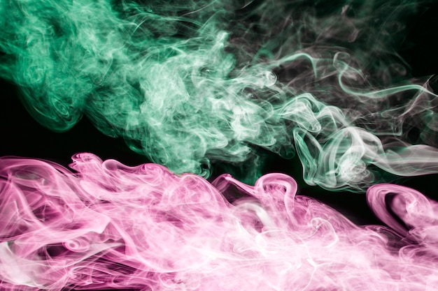 Free photo duotone wavy smoke on black background