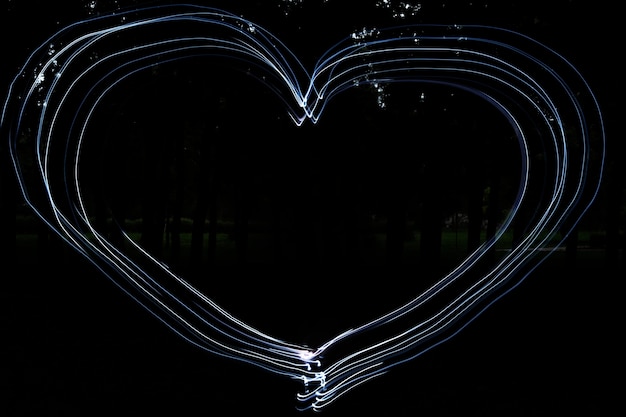 Free photo dynamic heart shaped lights background
