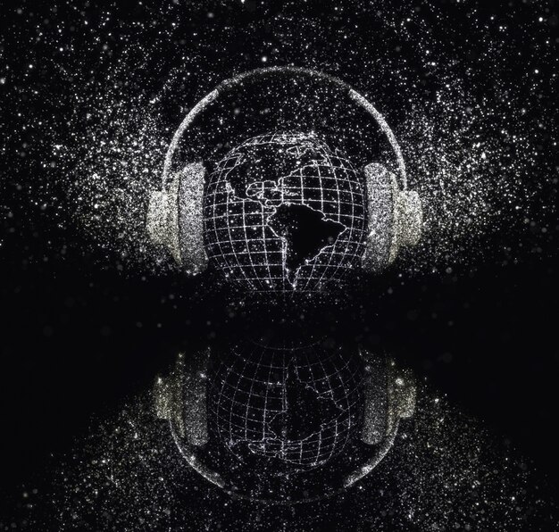 Earth with headphones with glittery effect on black background