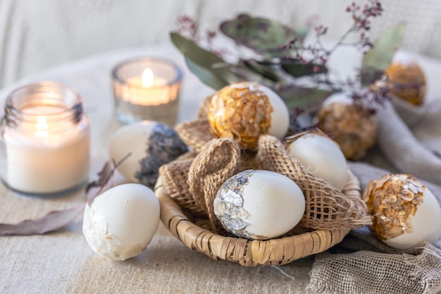 Free photo easter background with creative eggs and candles close up