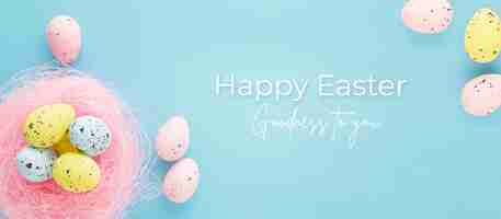 Free photo easter banner with eggs on a blue background