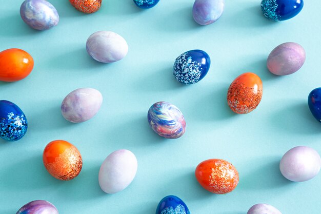 Easter colored eggs on colored. Easter with lots of eggs.