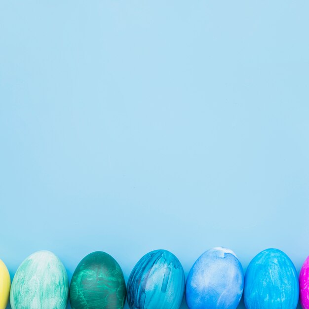 Easter eggs on blue background