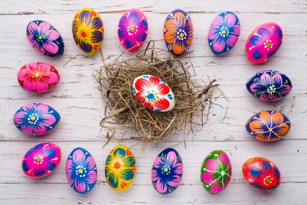 Easter eggs frame with colorful egg in the middle