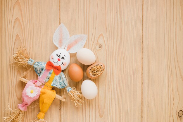 Easter eggs near toy bunny