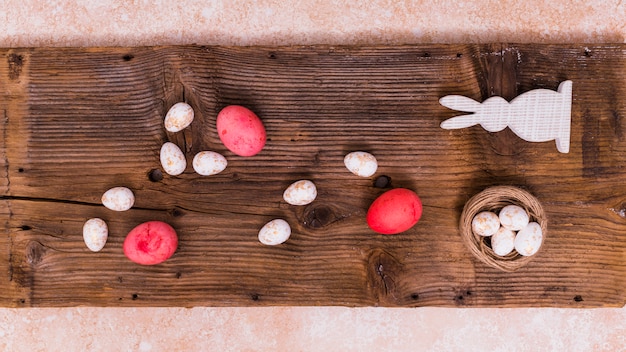 Easter eggs with rabbit on table