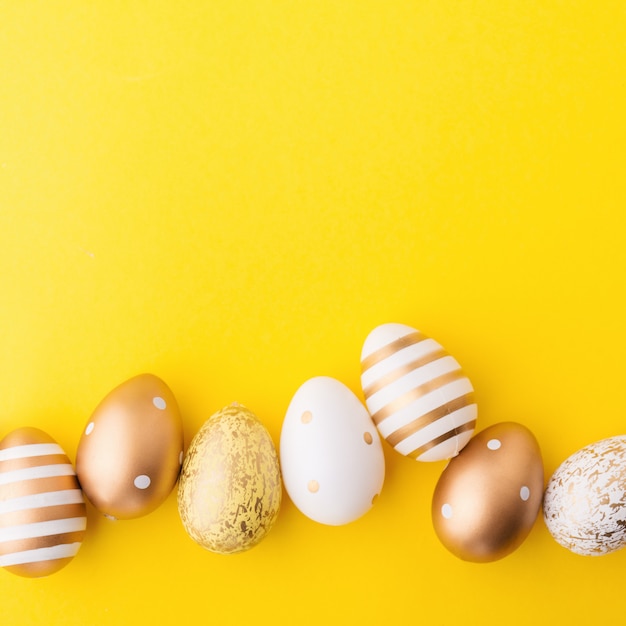 Easter Flat Lay of Eggs on yellow