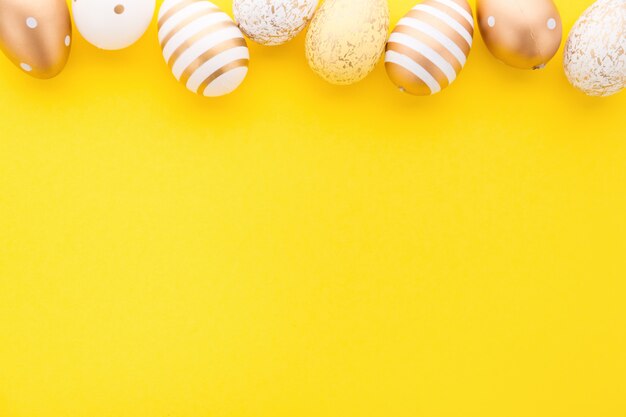 Easter Flat Lay of Eggs on yellow