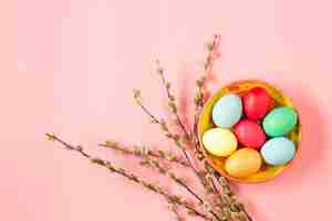 Free photo easter in office workplace on pink table