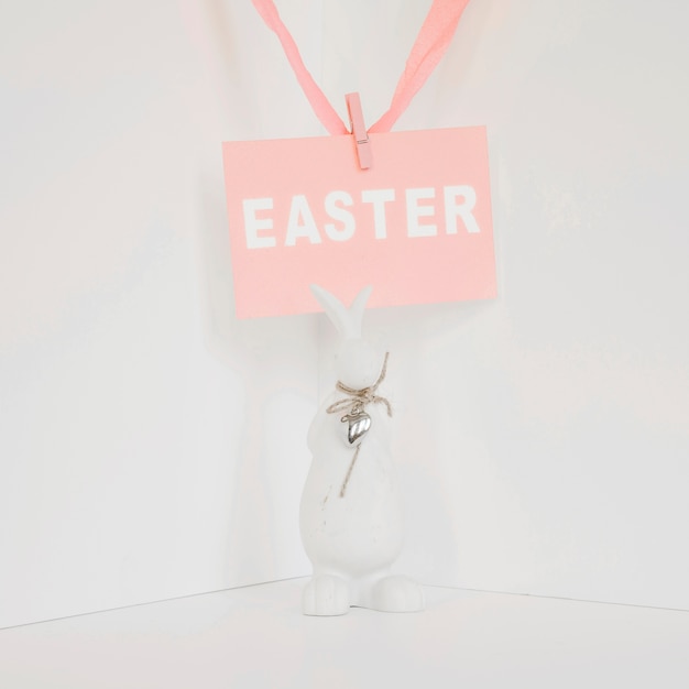 Easter paper and rabbit statuette
