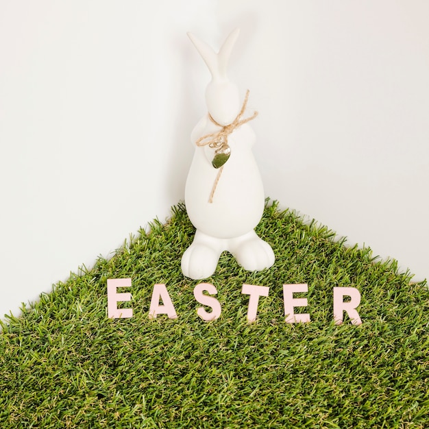 Free photo easter word and hare figurine