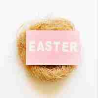 Free photo easter word on nest