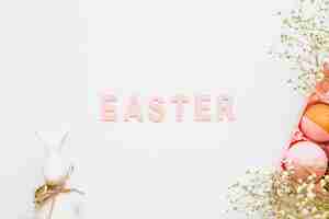 Free photo easter word and pink decorations