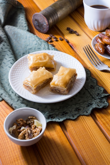 Eastern sweets on plate with walnuts